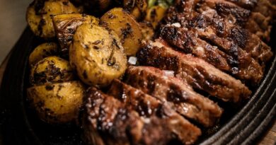 grilled meat on black ceramic plate